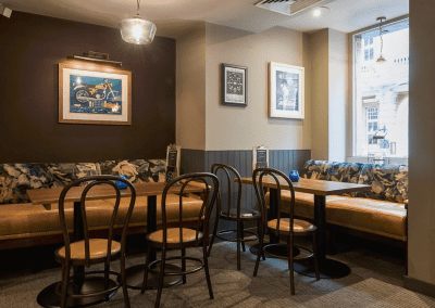 Pub interior of Bar Utopia, featuring contract furniture and bespoke fixed seating.