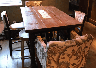 Pub interior of Mitchells and Butlers pubs, featuring contract furniture and bespoke curtains.
