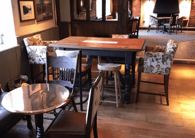 Pub interior of Mitchells and Butlers pubs, featuring contract furniture and bespoke curtains.