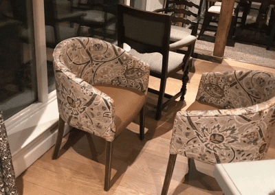 Pub interior featuring contract furniture and bespoke curtains.