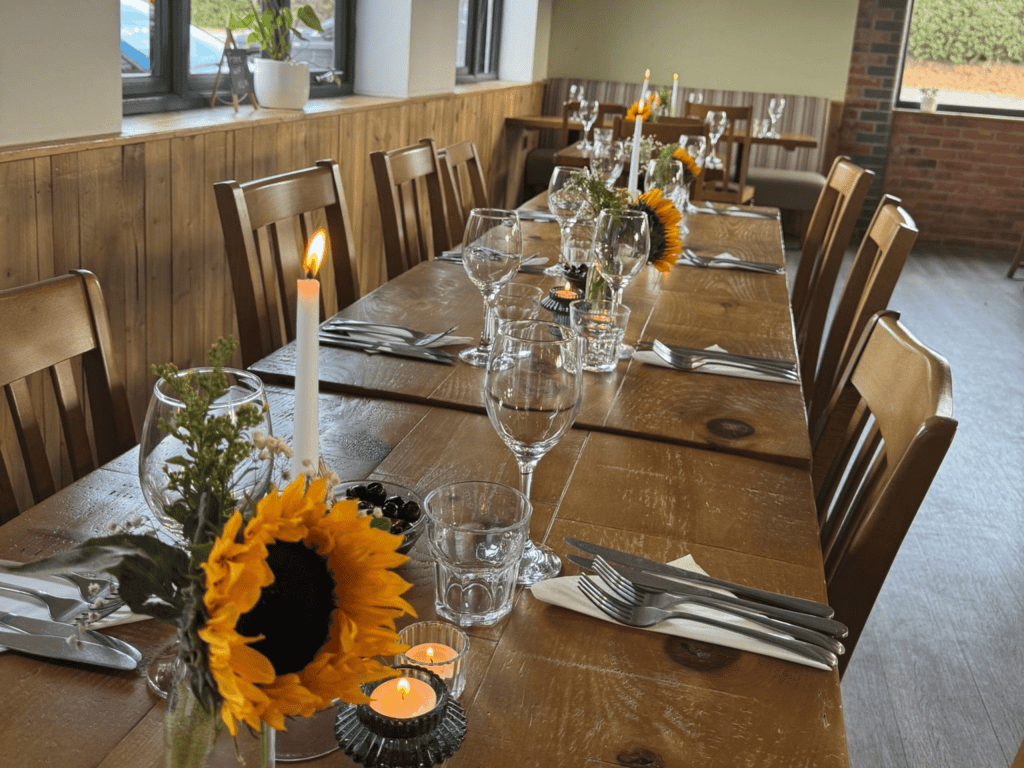 Bespoke café furniture featuring warm, rustic interiors and comfortable seating.